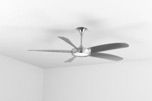 Silver ceiling fan with a white ceiling and walls