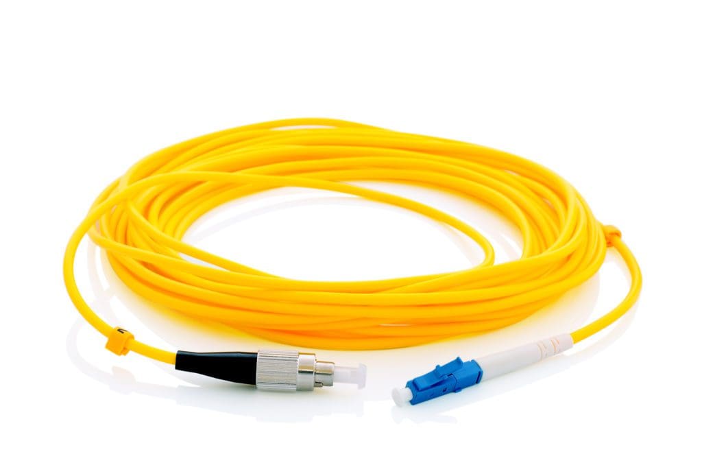 Yellow Fiber Optic cable wrapped nicely with connections facing outwards